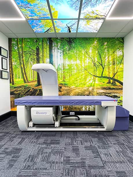 A customer standing ready for a 3d body scan